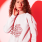 Round-Neck  Sweatshirt Mockup of a woman with Christmas gift